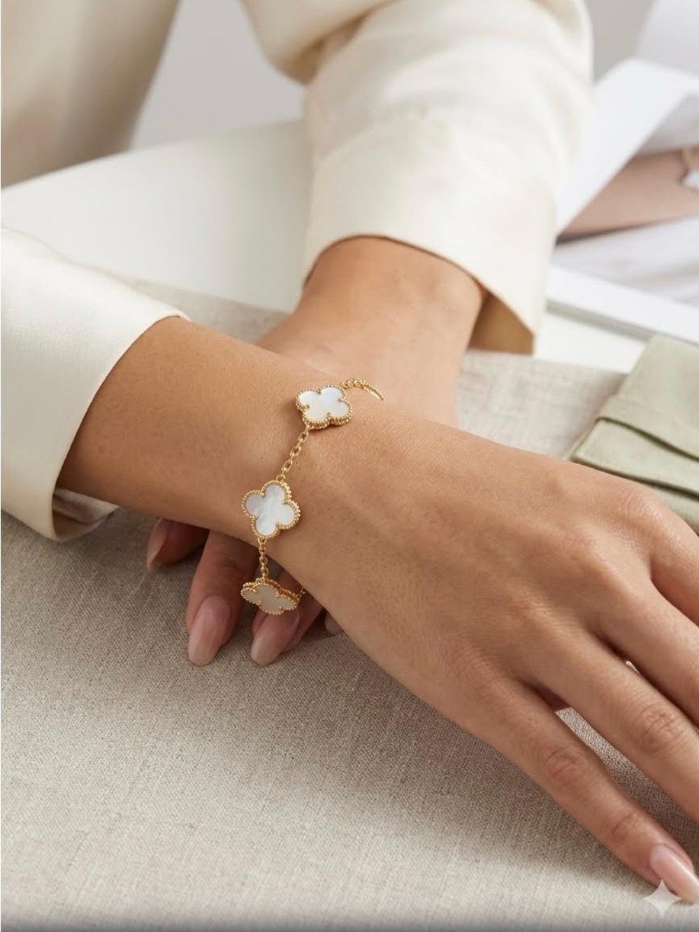 Gold Clover Charm Bracelet with White Mother-of-Pearl like Accents
